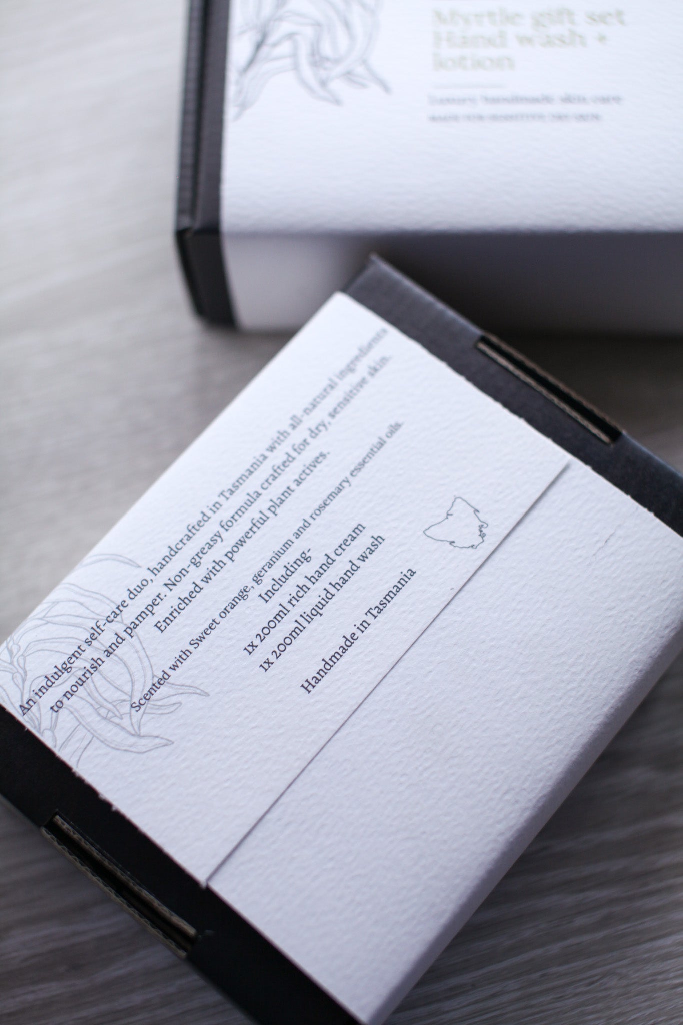 Close-up of a product packaging with text. Wholesale handmade