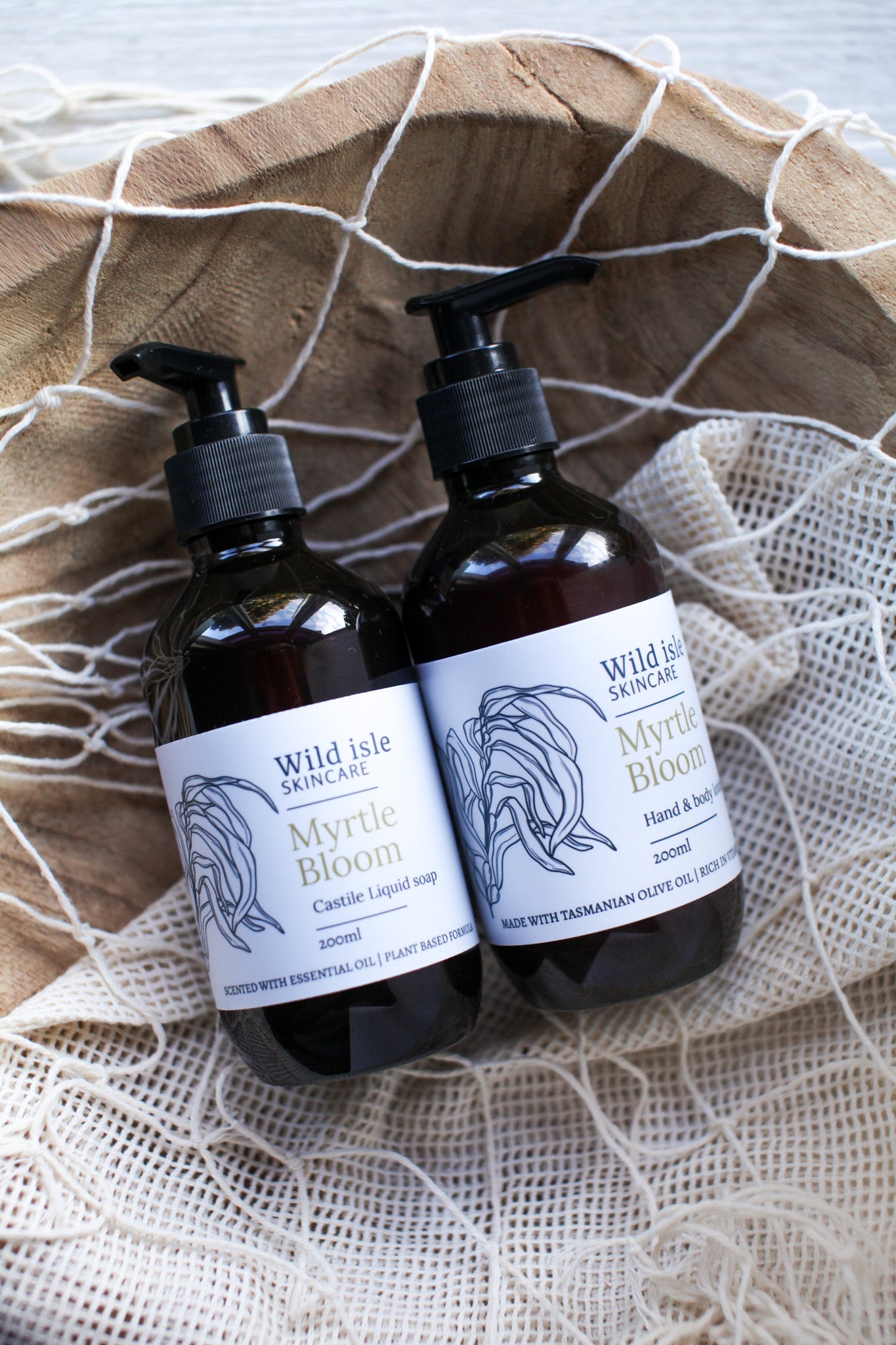 Two bottles of Wild Isle - Myrtle Bloom hand cream natural skincare tasmania
